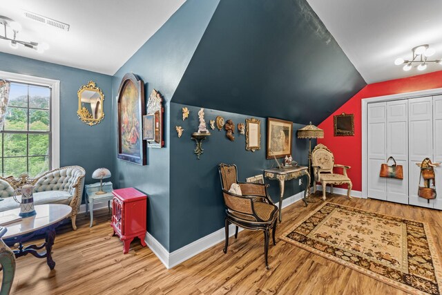 1313 Stayton Rd, Cumberland Furnace, TN 37051 - living area with lofted ceiling, wood finished floors, and baseboards