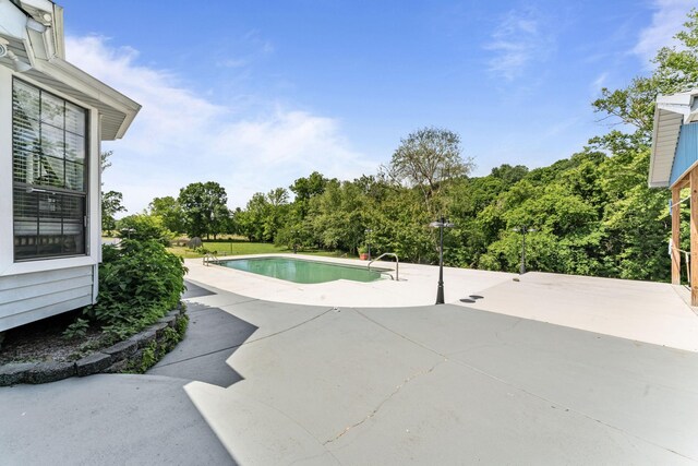 1313 Stayton Rd, Cumberland Furnace, TN 37051 - swimming pool featuring a patio
