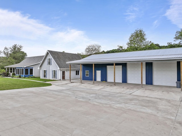 1313 Stayton Rd, Cumberland Furnace, TN 37051 - view of front of home with a garage and a front lawn