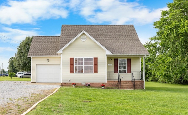 4520 Mount Zoar Latham Rd, Hopkinsville, KY 42240 - view of front facade with a porch, an attached garage, a front yard, driveway, and a shingled roof