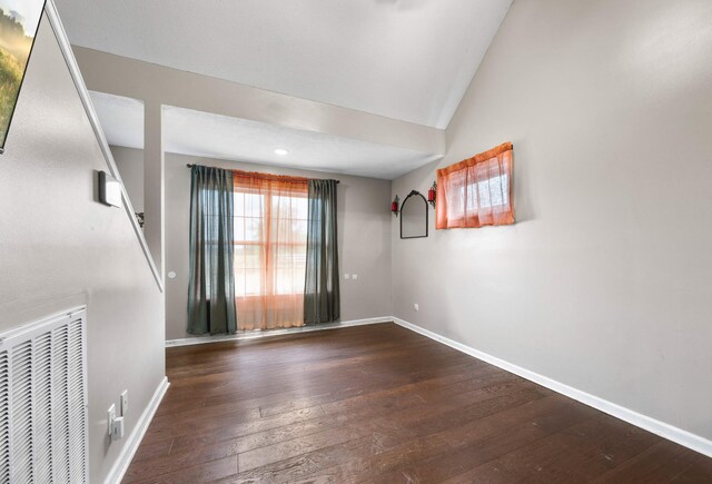 4520 Mount Zoar Latham Rd, Hopkinsville, KY 42240 - spare room featuring wood-type flooring, baseboards, and lofted ceiling