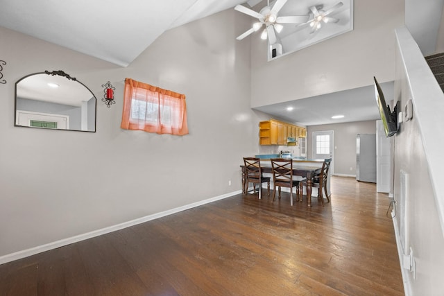 4520 Mount Zoar Latham Rd, Hopkinsville, KY 42240 - dining space featuring wood-type flooring, baseboards, ceiling fan, and high vaulted ceiling