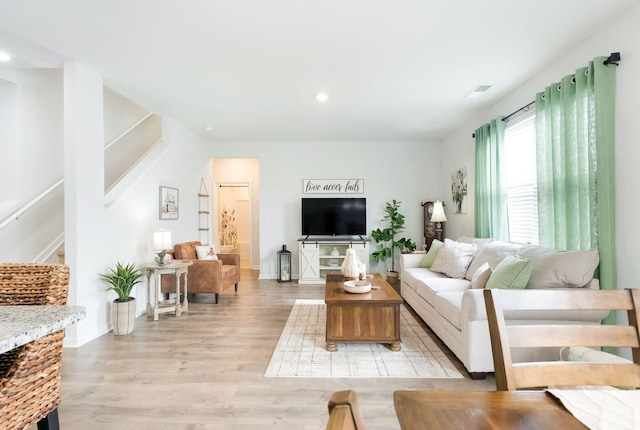 4043 Beach Way, White House, TN 37188 - living area featuring stairs, light wood-style floors, and recessed lighting