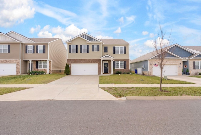 4043 Beach Way, White House, TN 37188 - view of front of house with driveway, brick siding, and a front lawn