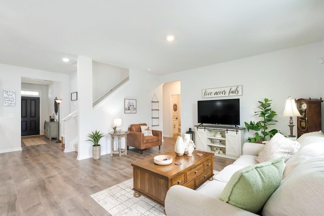 4043 Beach Way, White House, TN 37188 - living room featuring stairway, wood finished floors, recessed lighting, and baseboards
