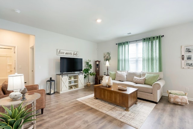 4043 Beach Way, White House, TN 37188 - living room with light wood finished floors, baseboards, and recessed lighting