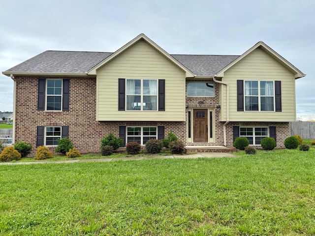 2617 Spring Arbor Ct, Cookeville, TN 38501 - split foyer home featuring brick siding, a front yard, and a shingled roof