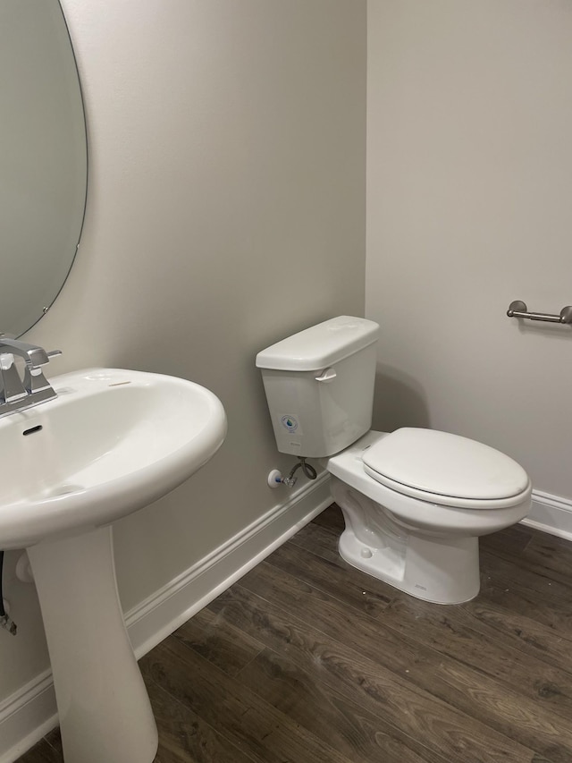 338 Savoy Loop, Nolensville, TN 37135 - half bath with toilet, baseboards, wood finished floors, and a sink