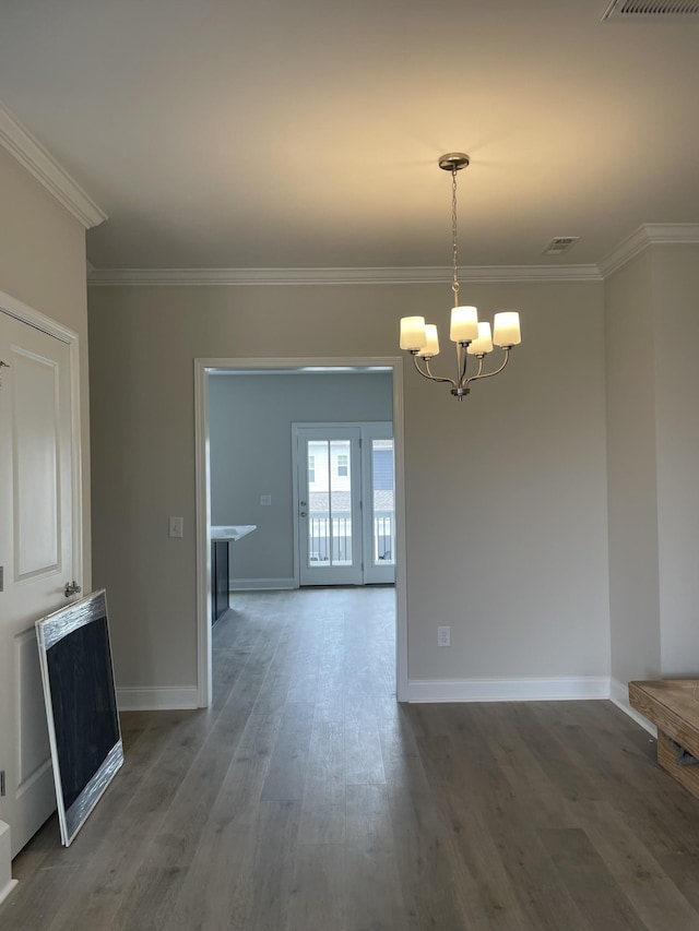 338 Savoy Loop, Nolensville, TN 37135 - unfurnished dining area featuring crown molding, a chandelier, wood finished floors, and baseboards
