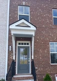 332 Savoy Loop, Nolensville, TN 37135 - doorway to property featuring brick siding