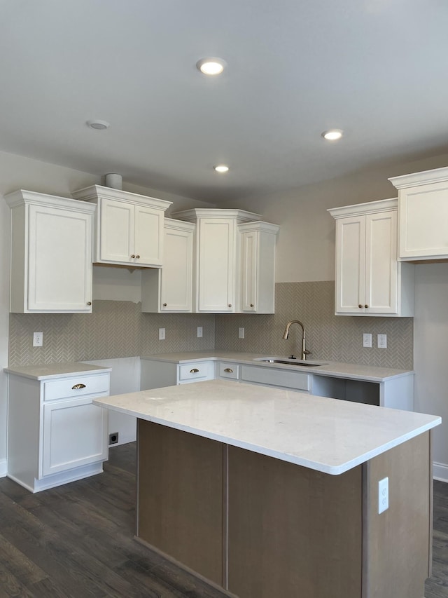 332 Savoy Loop, Nolensville, TN 37135 - kitchen featuring a sink, white cabinetry, a center island, dark wood-style flooring, and recessed lighting