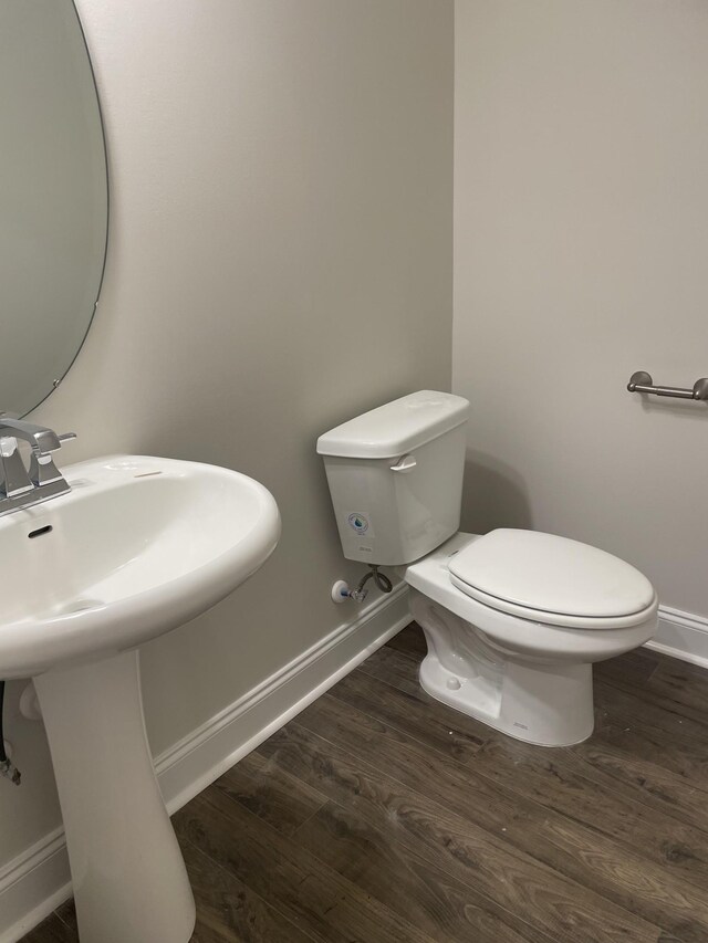 332 Savoy Loop, Nolensville, TN 37135 - half bath with toilet, baseboards, wood finished floors, and a sink