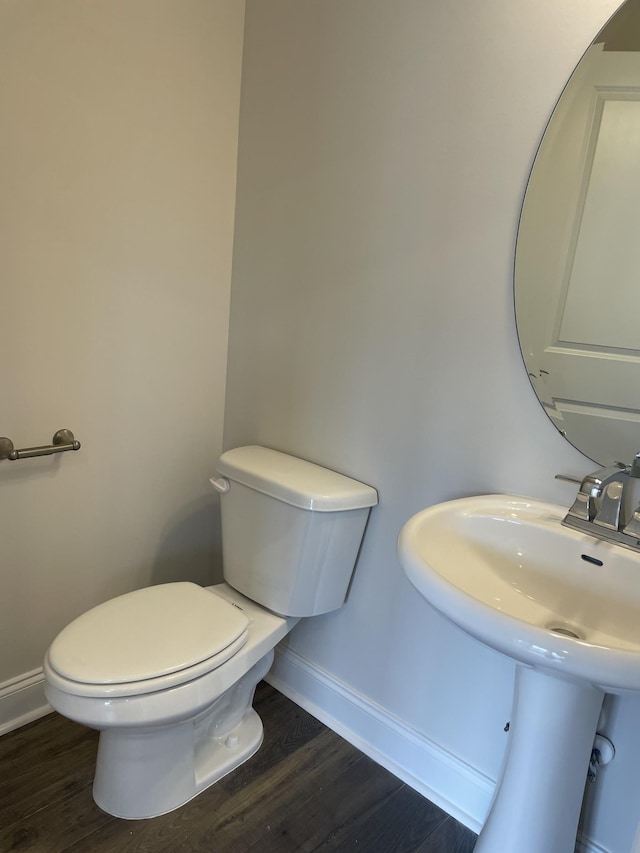 332 Savoy Loop, Nolensville, TN 37135 - bathroom featuring baseboards, toilet, wood finished floors, and a sink