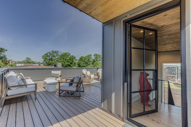 1302 Pillow St, Nashville, TN 37203 - wooden deck with an outdoor living space
