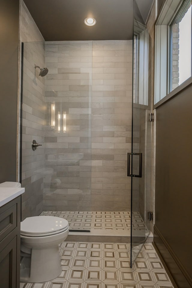 1302 Pillow St, Nashville, TN 37203 - full bath with toilet, a shower stall, vanity, and recessed lighting