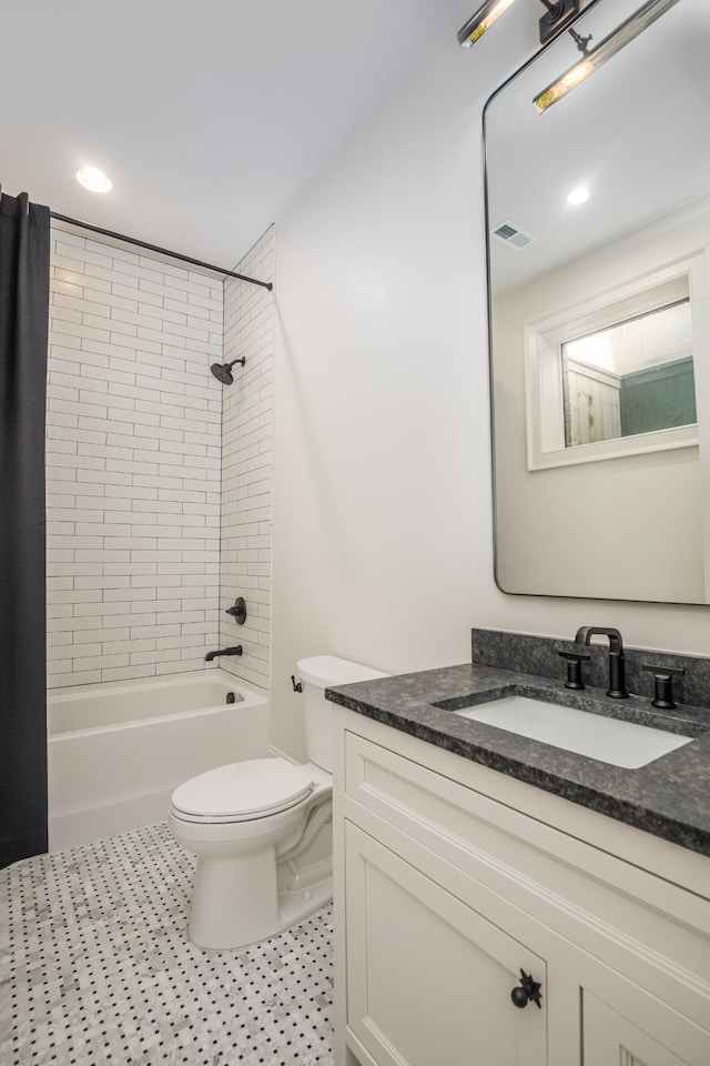 1302 Pillow St, Nashville, TN 37203 - full bathroom featuring vanity, toilet, tub / shower combination, and recessed lighting