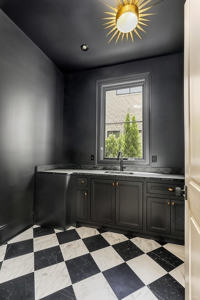 1302 Pillow St, Nashville, TN 37203 - kitchen featuring a sink, dark cabinets, and recessed lighting