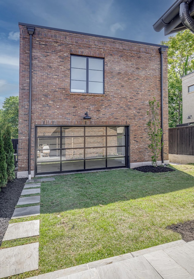 1302 Pillow St, Nashville, TN 37203 - rear view of house featuring brick siding