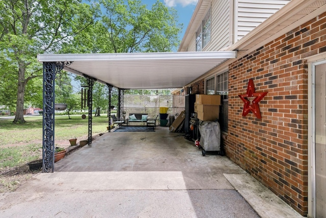 100 Townview Dr, Smyrna, TN 37167 - view of parking / parking lot featuring concrete driveway and an attached carport