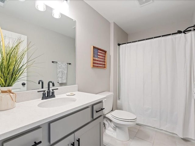 401 Queen Ln, Gallatin, TN 37066 - full bathroom featuring vanity, toilet, tile patterned floors, and shower / tub combo with curtain
