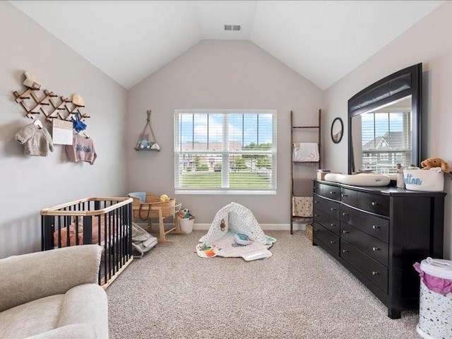 401 Queen Ln, Gallatin, TN 37066 - bedroom with a crib, vaulted ceiling, light colored carpet, and baseboards