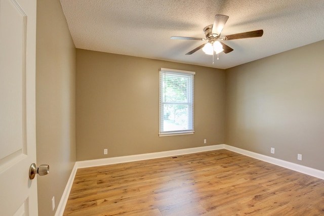 1783 Forrestdale Dr, Clarksville, TN 37042 - empty room featuring light wood finished floors, a textured ceiling, ceiling fan, and baseboards