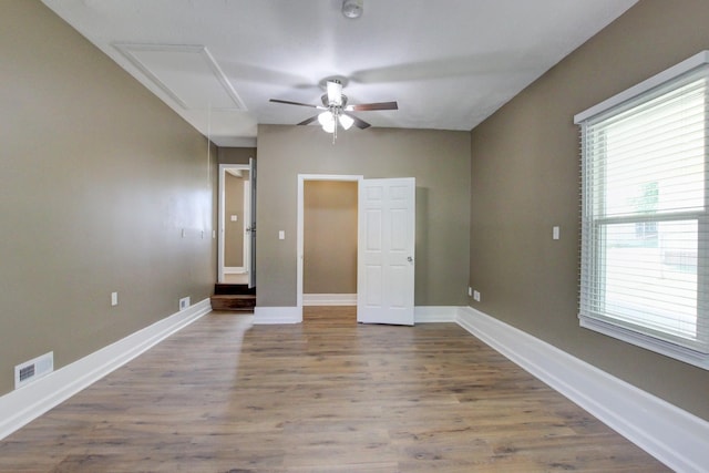 1783 Forrestdale Dr, Clarksville, TN 37042 - unfurnished room featuring attic access, ceiling fan, wood finished floors, and baseboards