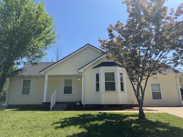 1783 Forrestdale Dr, Clarksville, TN 37042 - view of front of house featuring a front lawn, a porch, crawl space, and roof with shingles