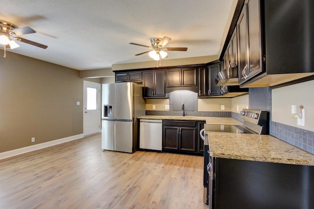 1783 Forrestdale Dr, Clarksville, TN 37042 - kitchen with appliances with stainless steel finishes, ceiling fan, light wood-type flooring, and baseboards