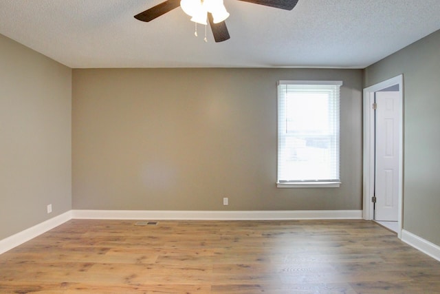 1783 Forrestdale Dr, Clarksville, TN 37042 - unfurnished room featuring ceiling fan, wood finished floors, a textured ceiling, and baseboards
