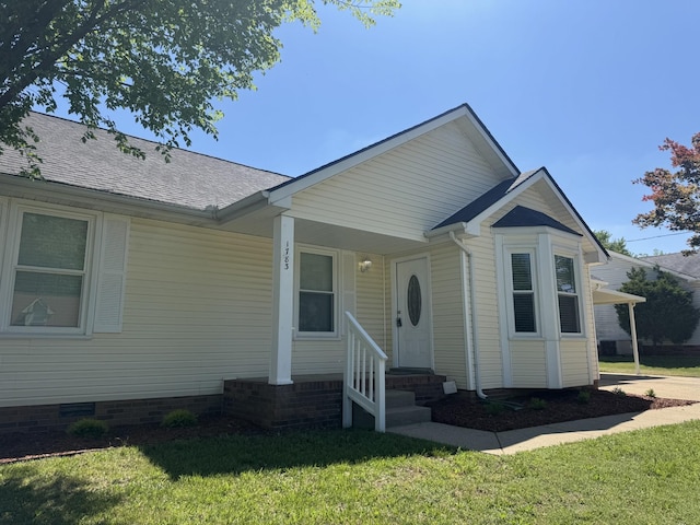 1783 Forrestdale Dr, Clarksville, TN 37042 - view of front of house featuring a front yard, a shingled roof, and crawl space