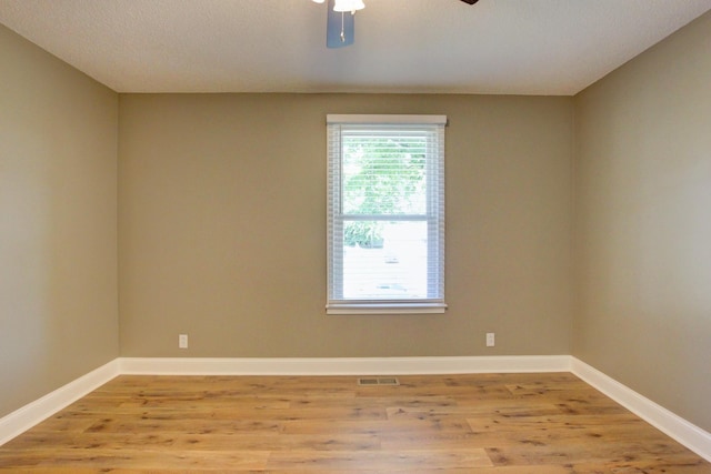 1783 Forrestdale Dr, Clarksville, TN 37042 - empty room with light wood-style floors, a ceiling fan, and baseboards