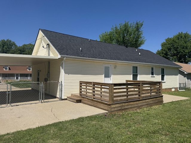 1783 Forrestdale Dr, Clarksville, TN 37042 - back of property with a wooden deck, a gate, a shingled roof, and a carport