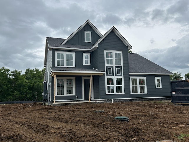 7318 Winners Rd, Murfreesboro, TN 37129 - view of front of property with board and batten siding, a porch, and roof with shingles