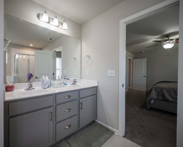 430 Burnley Way, Murfreesboro, TN 37128 - ensuite bathroom with double vanity, a stall shower, ceiling fan, and baseboards