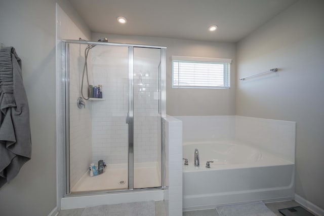 430 Burnley Way, Murfreesboro, TN 37128 - bathroom featuring a garden tub, a stall shower, baseboards, and recessed lighting