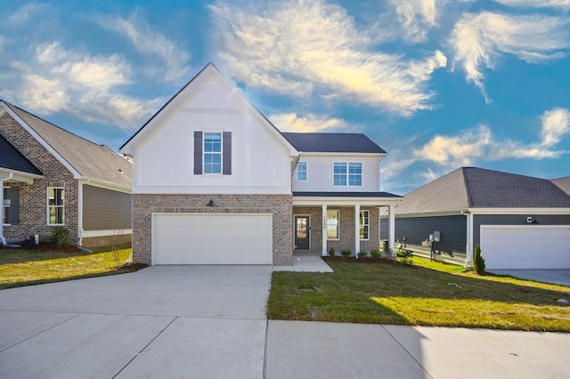 7560 Maggie Dr, Antioch, TN 37013 - view of front of house with brick siding, concrete driveway, a front lawn, an attached garage, and a porch