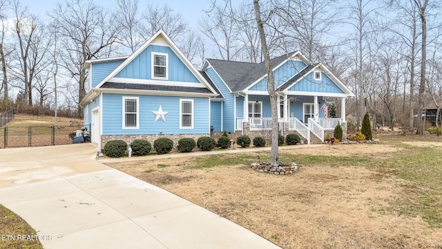 569 Station Circle Cir, Tullahoma, TN 37388 - craftsman inspired home featuring covered porch, board and batten siding, stone siding, and driveway
