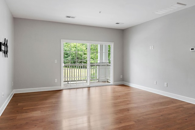 8221 Lenox Creekside Dr Unit 10, Antioch, TN 37013 - empty room with wood finished floors and baseboards