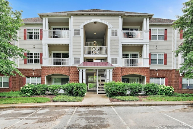 8221 Lenox Creekside Dr Unit 10, Antioch, TN 37013 - view of property featuring uncovered parking