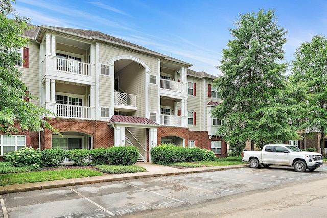 8221 Lenox Creekside Dr Unit 10, Antioch, TN 37013 - view of property featuring uncovered parking