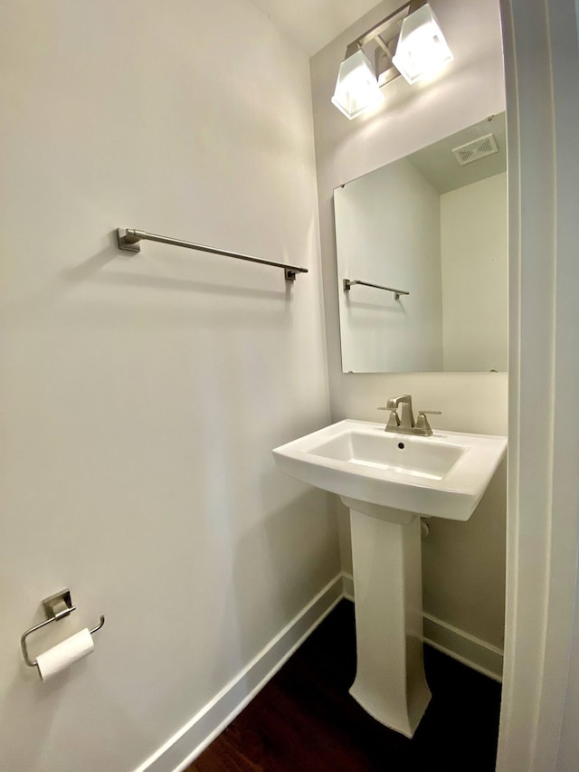 4316 Summercrest Blvd Unit 800, Antioch, TN 37013 - bathroom with baseboards, wood finished floors, and a sink