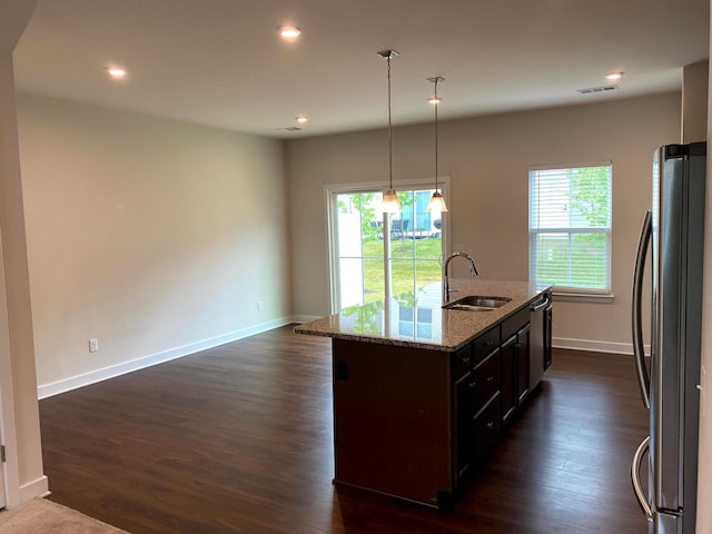 4316 Summercrest Blvd Unit 800, Antioch, TN 37013 - kitchen featuring appliances with stainless steel finishes, a sink, plenty of natural light, light stone counters, and recessed lighting