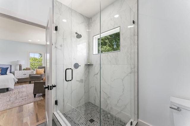 712 N 5th St, Nashville, TN 37207 - ensuite bathroom featuring a marble finish shower, wood finished floors, and toilet