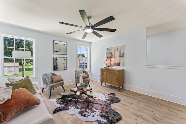 712 N 5th St, Nashville, TN 37207 - living room featuring wood finished floors, a ceiling fan, and baseboards