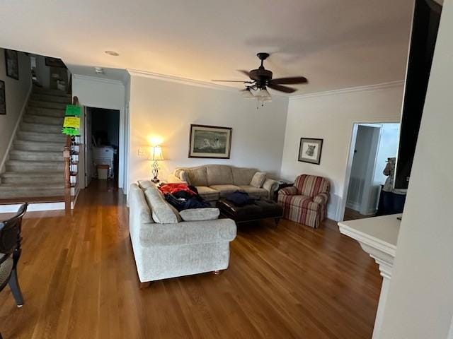 106 Rigney Rd, Manchester, TN 37355 - living room featuring ornamental molding, a ceiling fan, wood finished floors, and stairway