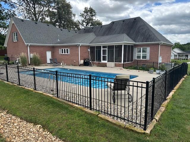 106 Rigney Rd, Manchester, TN 37355 - view of swimming pool featuring a sunroom and a patio