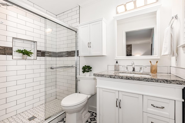 109 Pebble Creek Rd, Franklin, TN 37064 - bathroom with vanity, a shower stall, toilet, and ornamental molding