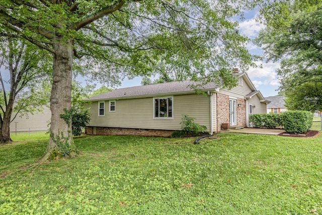 109 Pebble Creek Rd, Franklin, TN 37064 - view of side of property with a chimney and brick siding