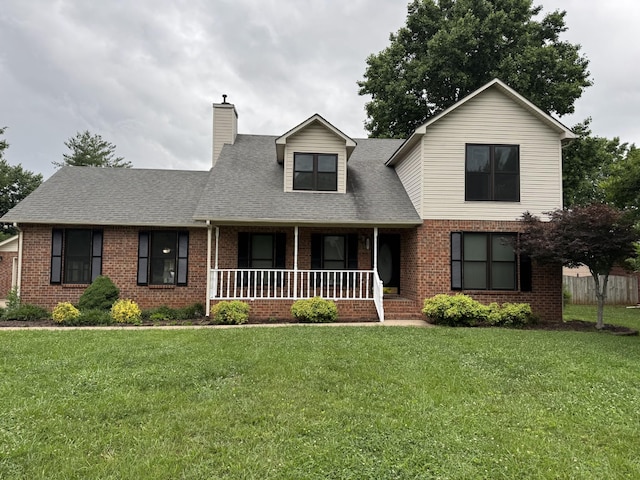 407 Haynes Haven Ln, Murfreesboro, TN 37129 - traditional-style house featuring brick siding, covered porch, a chimney, and a shingled roof
